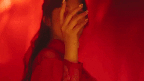 Shuhua from Gidle with a red background, not a link