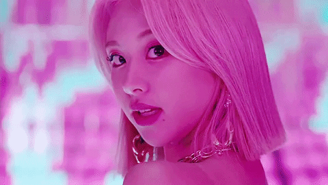 Chaeyoung from Twice with a pink background, not a link
